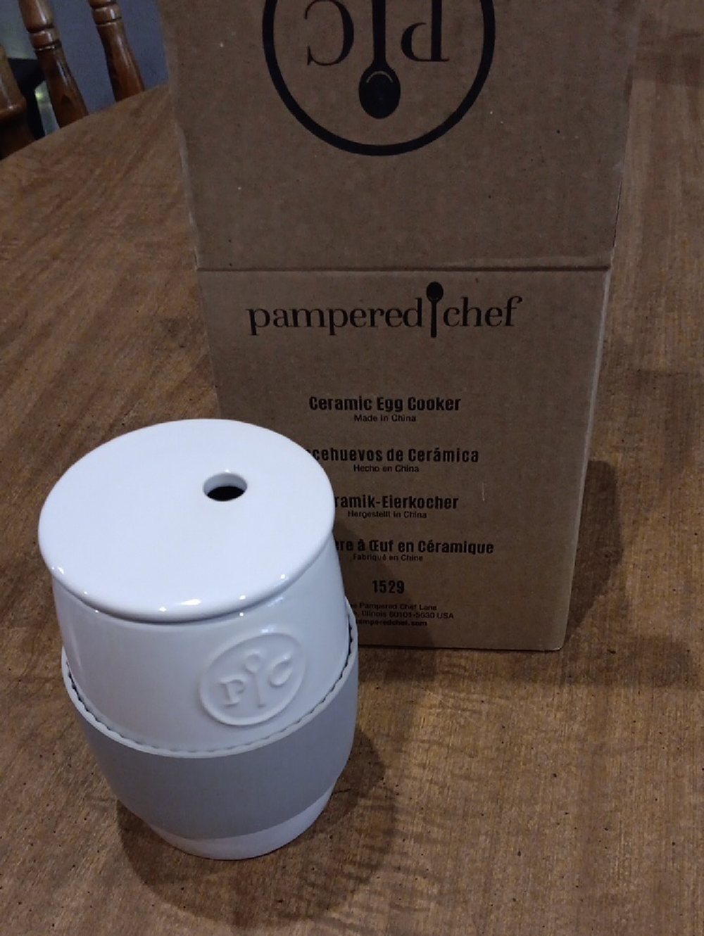 Pampered Chef White Ceramic Egg Cooker with Gray Silicone Grip